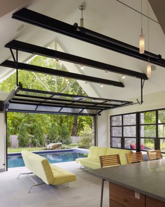 Glass Garage Door by the Swimming Pool